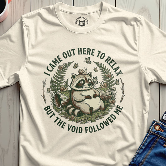 Raccoon in forest with snails, text "I came out here to relax but the void followed me."