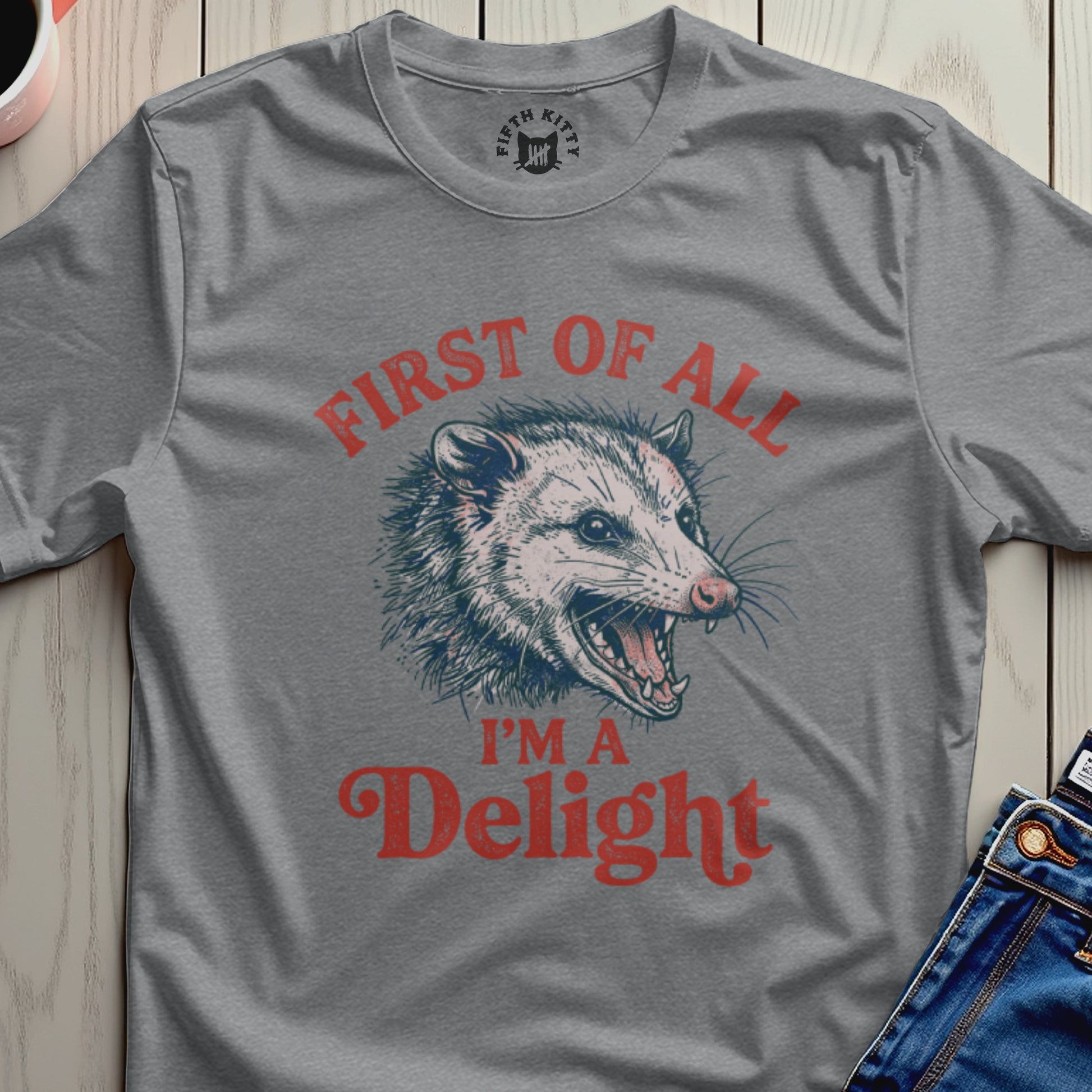 Gray t-shirt with vintage possum graphic and "First of all, I'm a Delight" text.