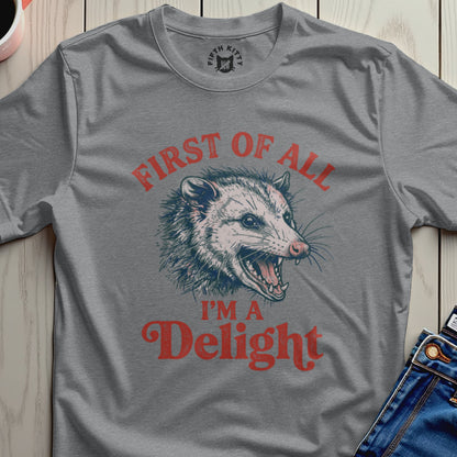 Gray t-shirt with vintage possum graphic and "First of all, I'm a Delight" text.
