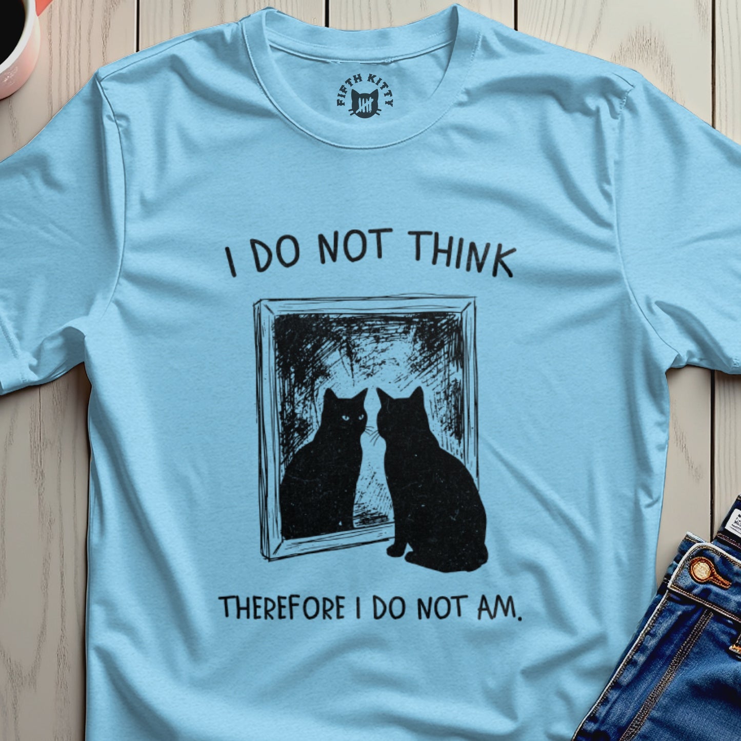 Light blue t-shirt with black cat reflection and text "I do not think therefore I do not am."