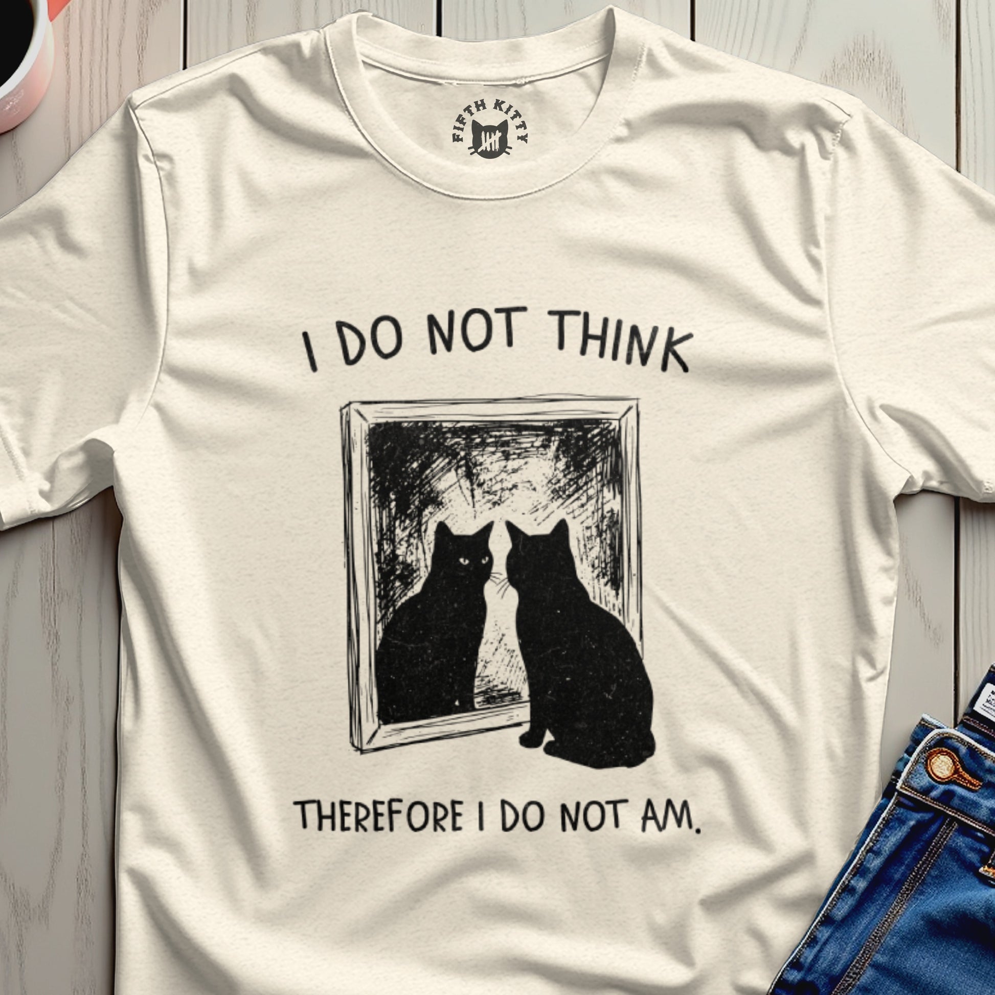 Cream t-shirt with black cat in mirror and "I do not think therefore I do not am" text.