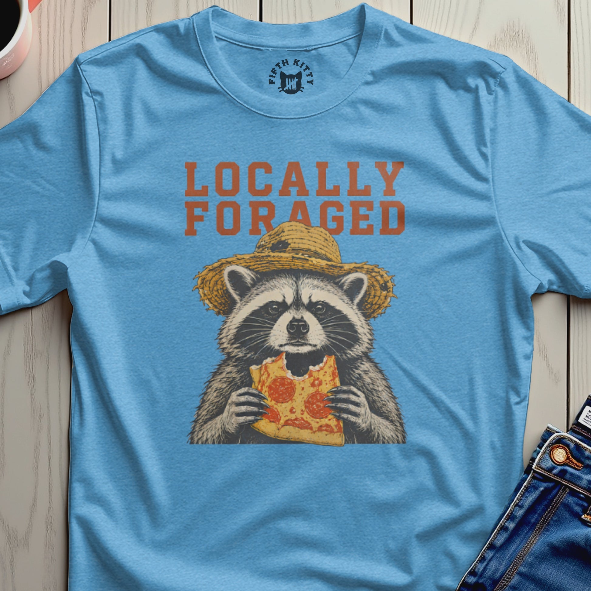Raccoon wearing a straw hat eating pizza, "Locally Foraged" text.