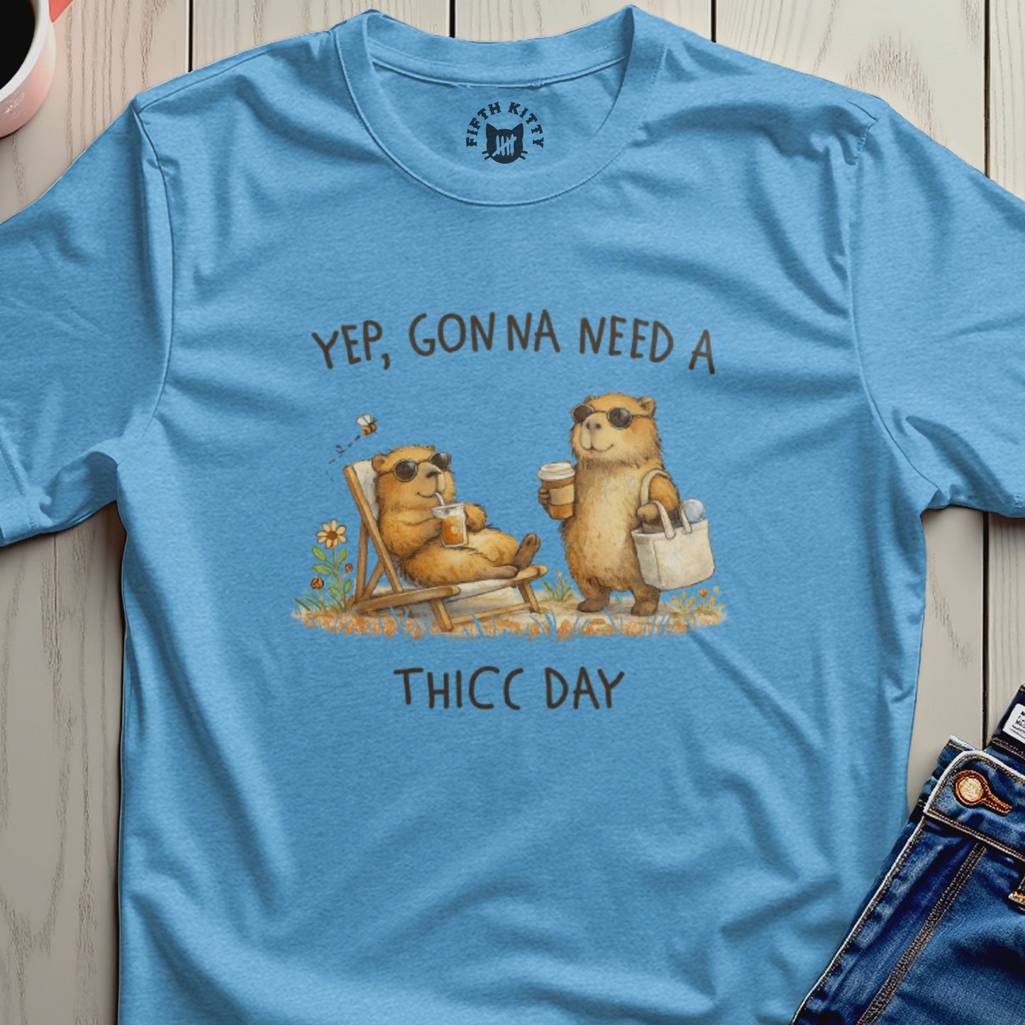 Light blue t-shirt with "Yep, Gonna Need A THICC DAY" and two bears on it.