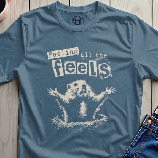 T-shirt with a cartoon groundhog with outstretched arms and "Feeling all the feels" text.