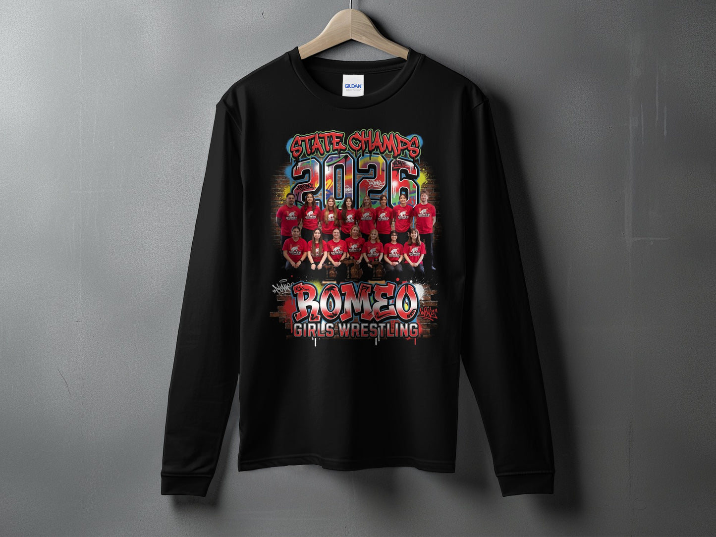 Black long-sleeve shirt with "State Champs 2023 Girls Wrestling" and team photo.