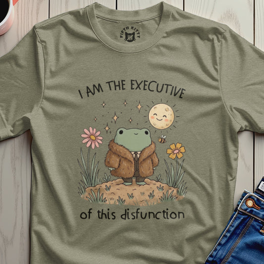 T-shirt with a frog wearing a fur coat, moon, flowers, and text.