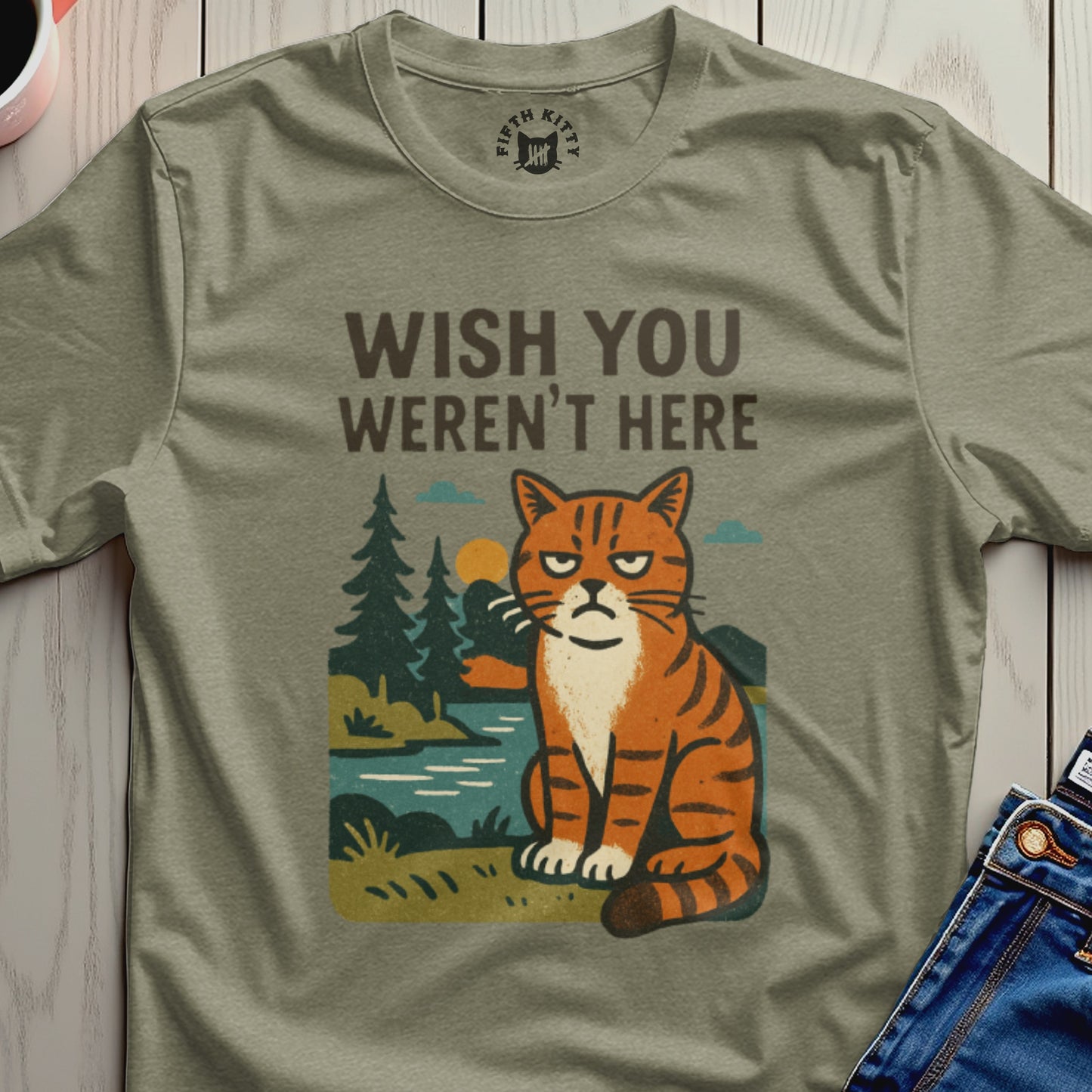 T-shirt with text "WISH YOU WEREN'T HERE" and a grumpy cat illustration.