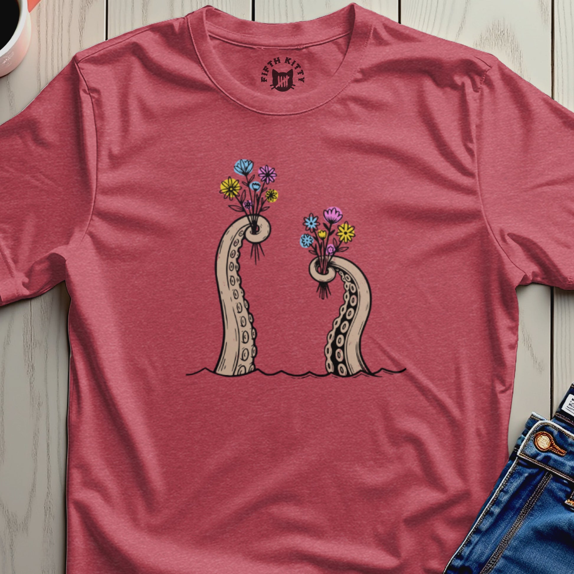 Two octopus tentacles holding colorful flower bouquets.