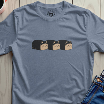 Blue t-shirt with a graphic of three loaf-shaped cats in a row and "Fifth Kitty" logo.