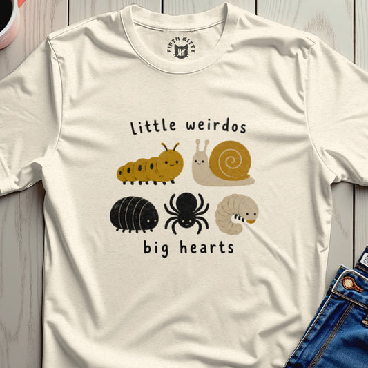 Cream t-shirt with "little weirdos big hearts" text and illustrations of insects.