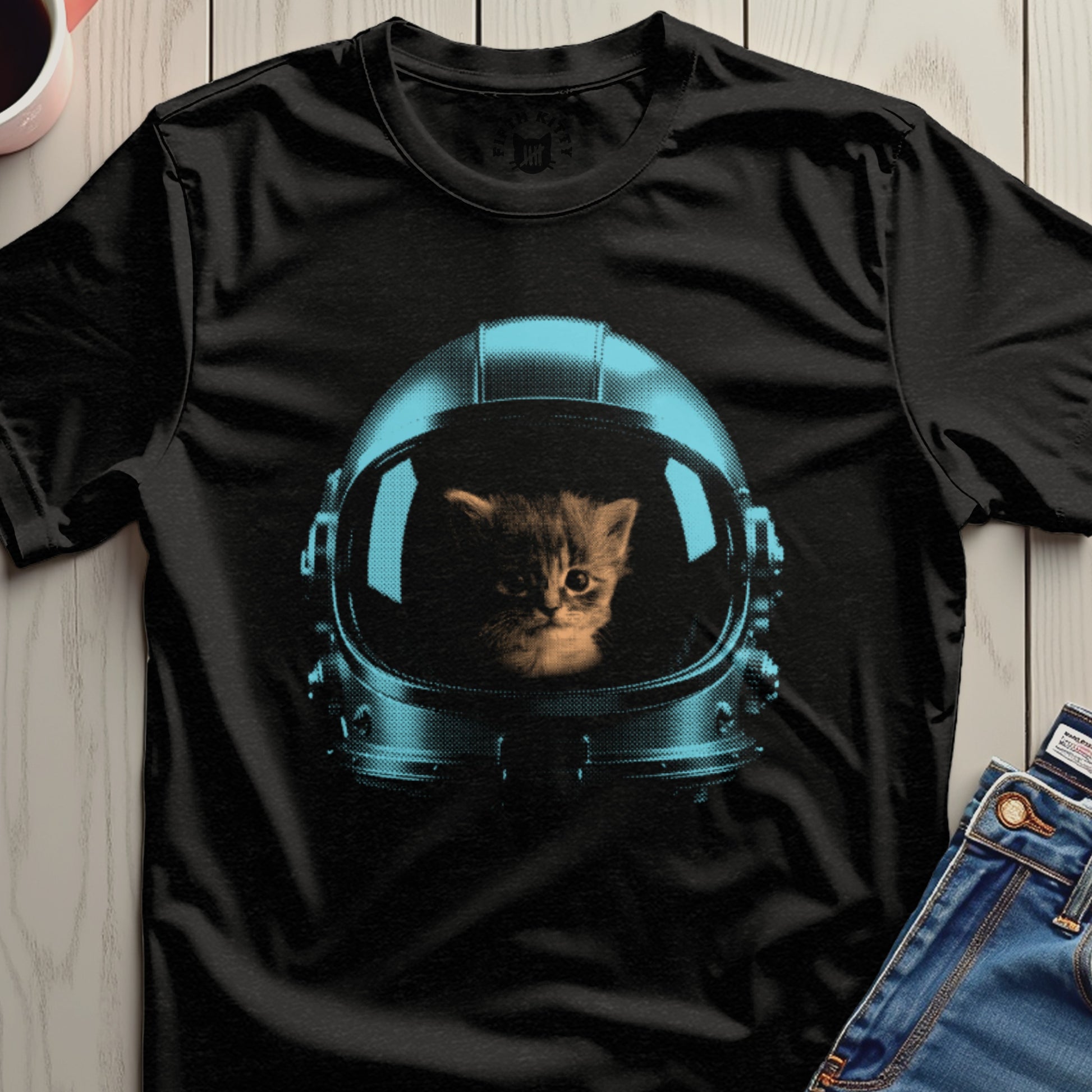 Cute Kitten in Astronaut Helmet on Black Shirt