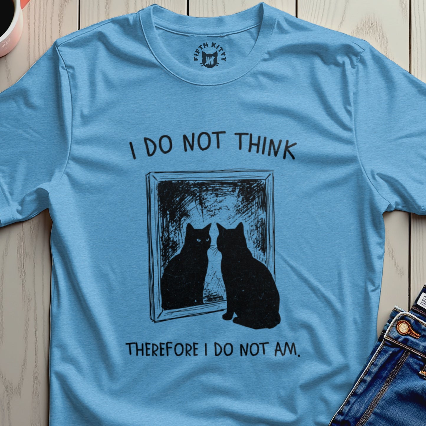Blue t-shirt with a black cat reflected in a mirror and the text "I do not think therefore I do not am."